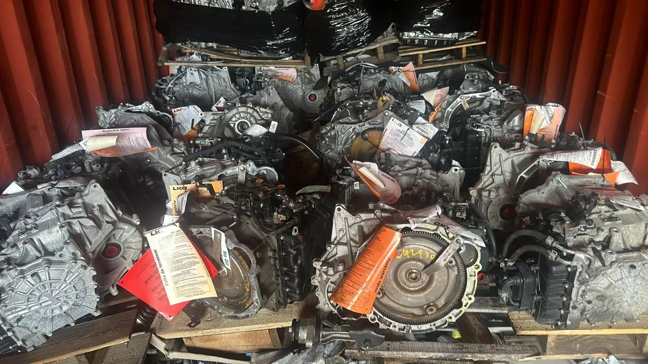 Tagged used gearboxes and transmissions loaded inside a shipping container